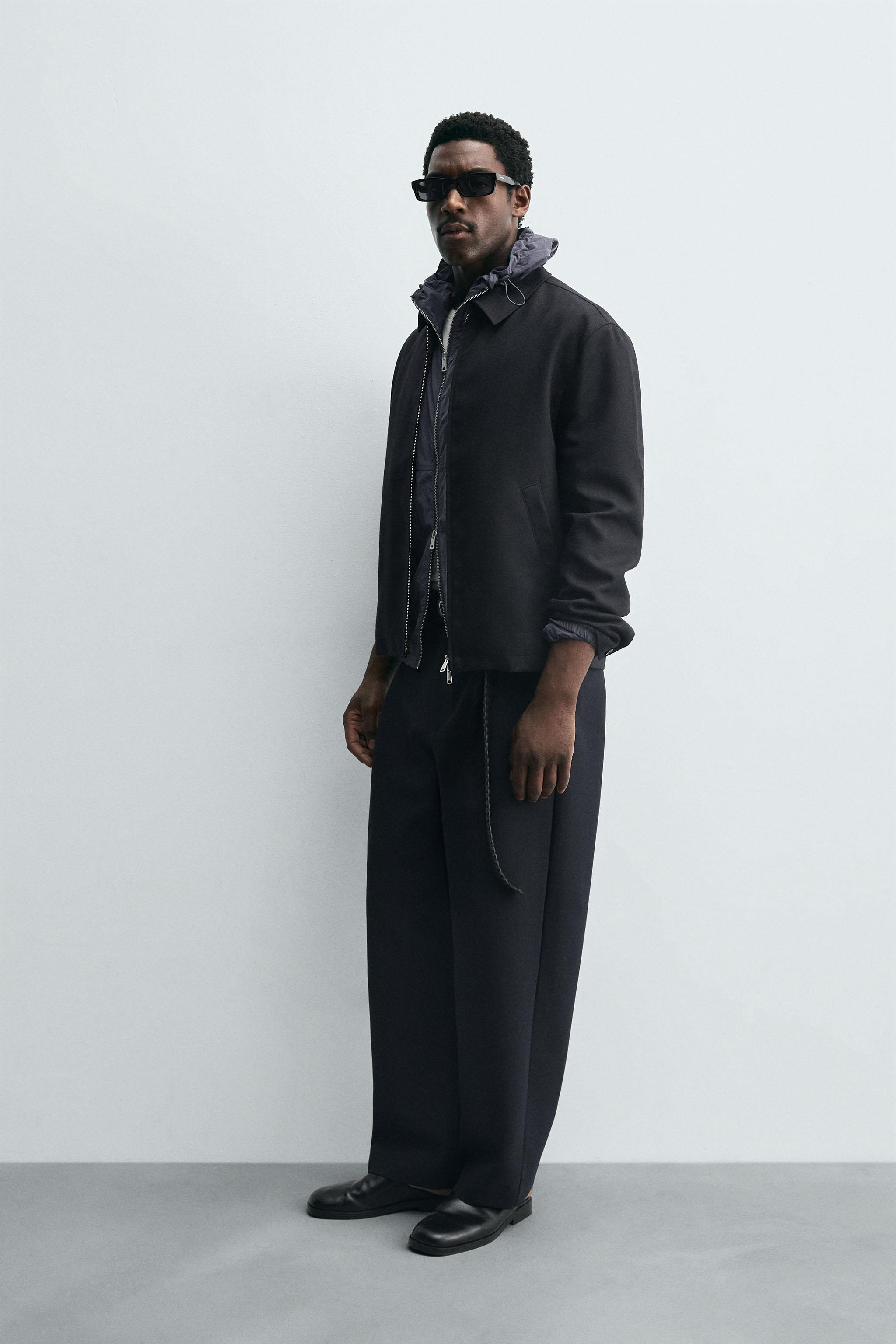 PLEATED RELAXED FIT PANTS